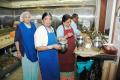 ladies preparing food in the GHS kitchen ladies preparing food in the kitchen at GHS